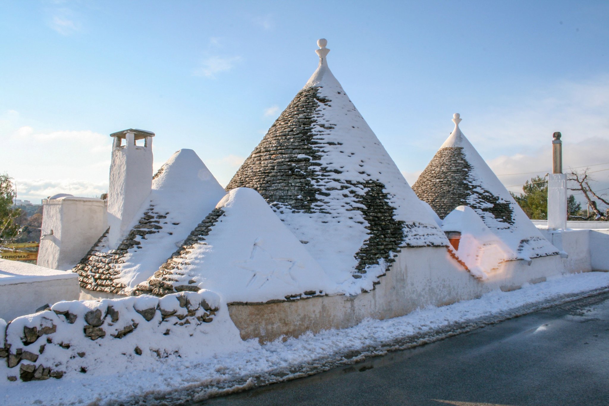 Trulli with snow, Puglia, Italy