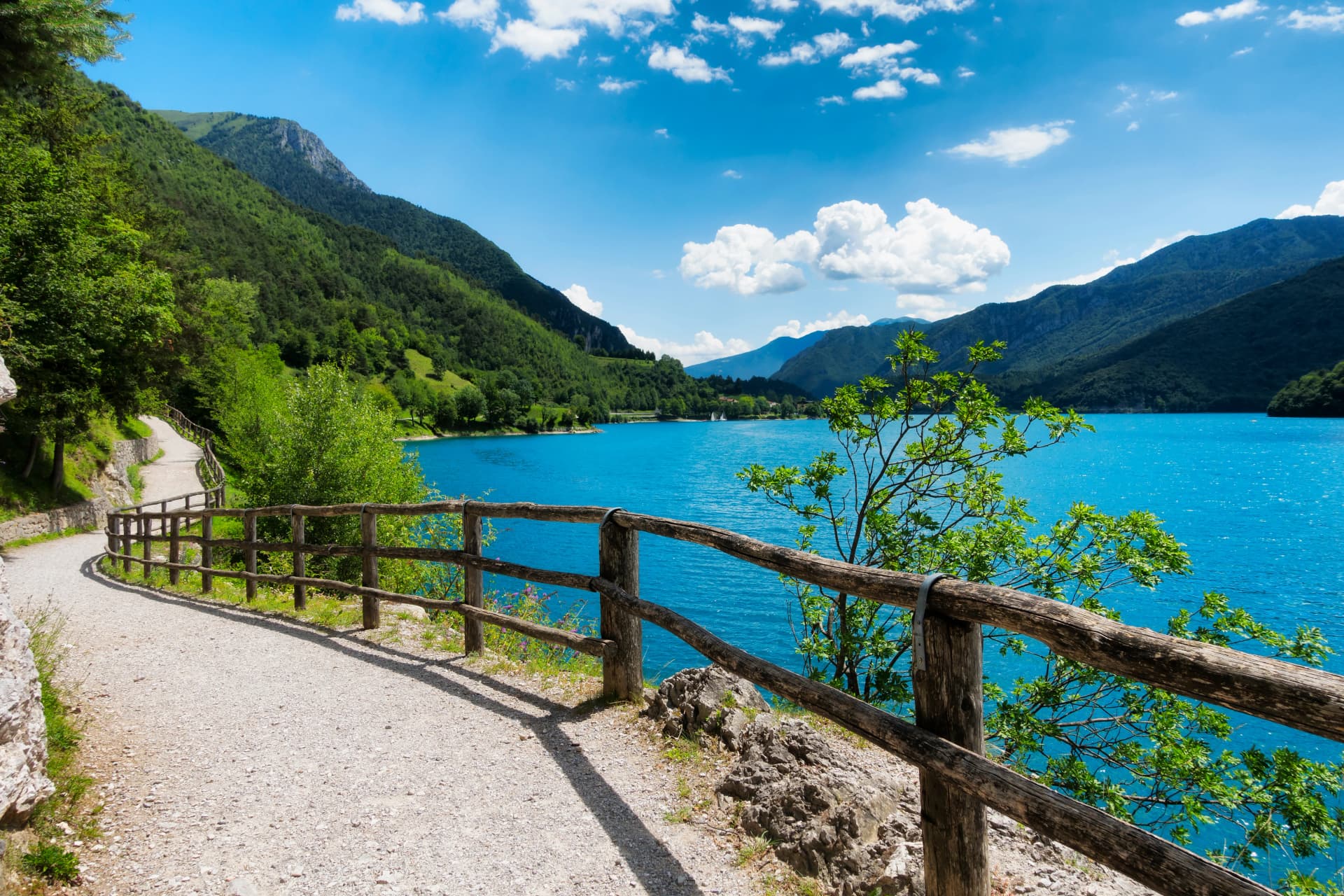 Mountain Ledro lake and his bike path in the Italian Dolomites