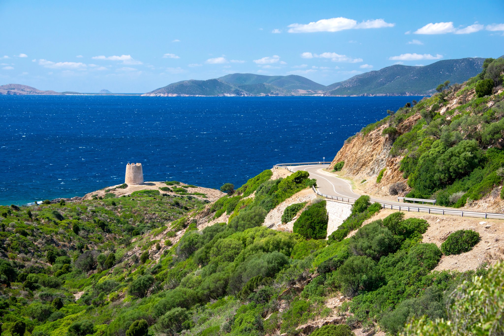 Viewpoint of the coast of Teulada from the coastal road SP71, with the tower of Piscinnì, Sardinia