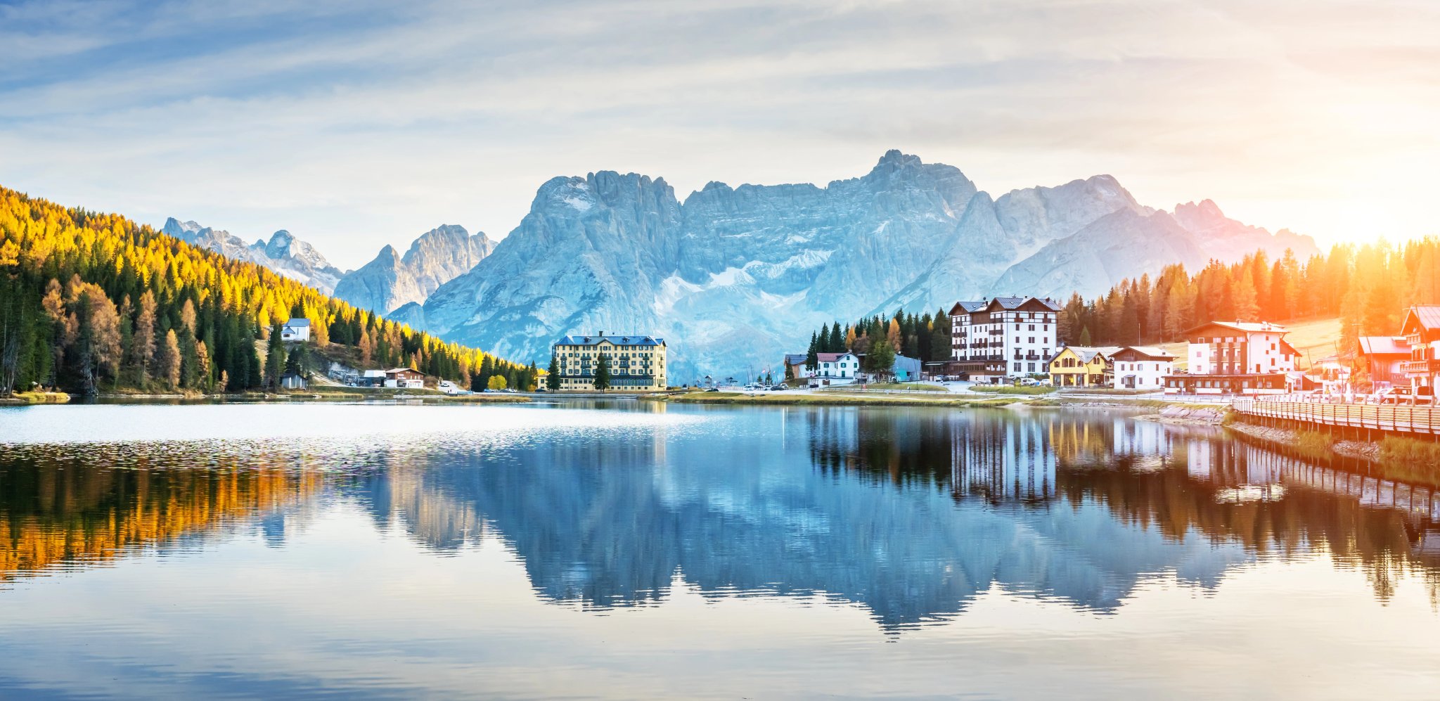 Panoramic autumn view of Misurina lake and Misurina village, National Park Tre Cime di Lavaredo, Auronzo, Dolomiti Alps, South Tyrol, Italy, Europe. Landscape photography