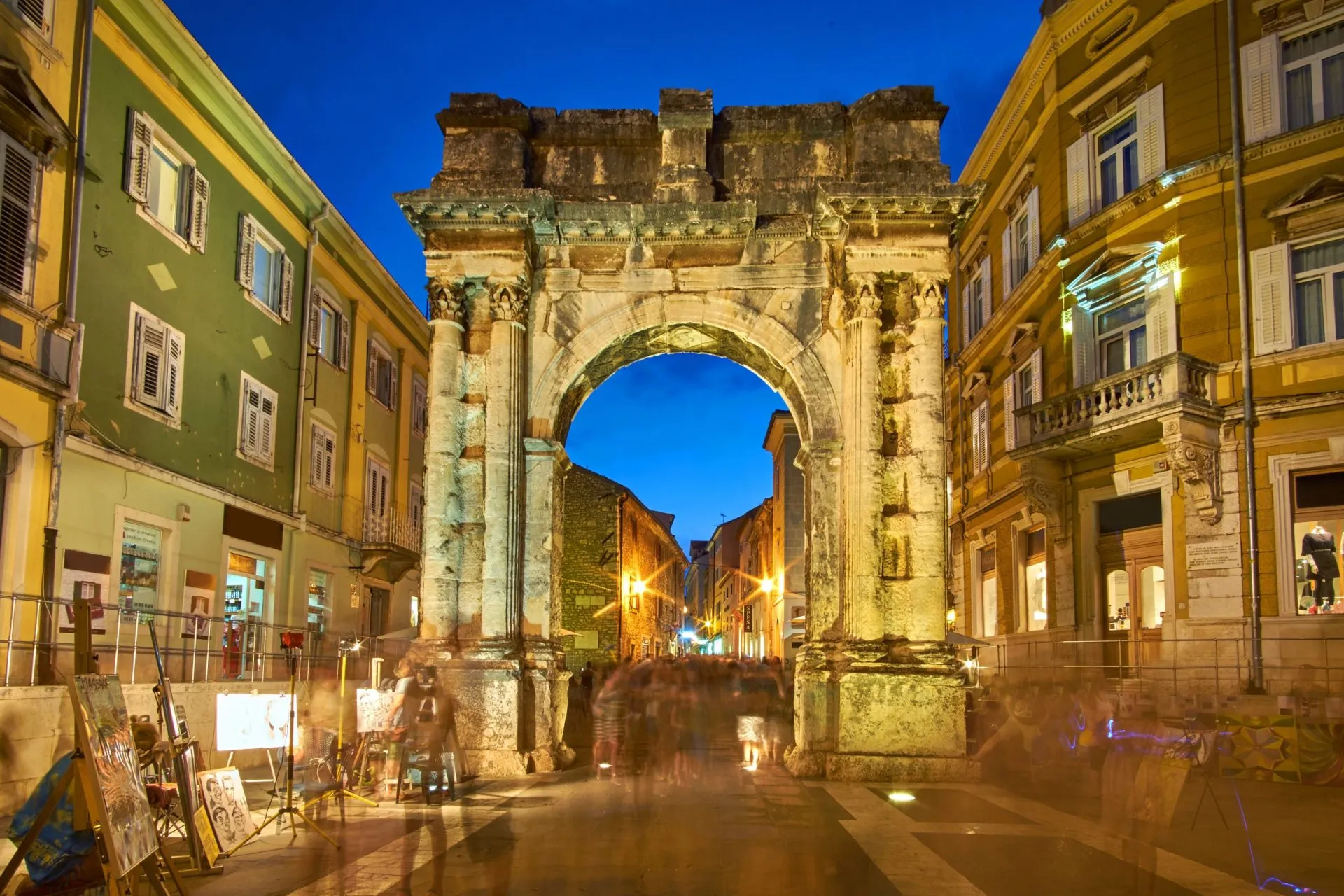 Golden gate sergius arch in pula at night croatia stockpack adobe stock scaled