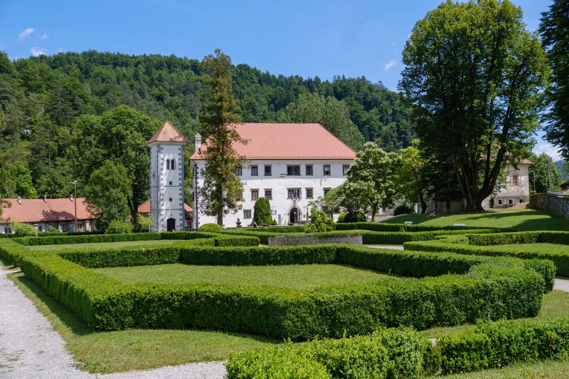Polhov gradec mansion with blooming garden in summer stockpack adobe stock scaled