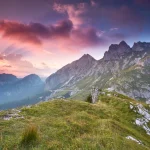 Sonnenuntergang in den slowenischen alpen mount mangart gipfel stockpack adobe stock scaled